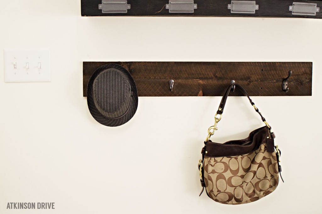 Organize your entry way this Winter with an easy DIY option for organizing coats, hats, purses, and more! This project is beautiful and functional! /// by Atkinson Drive