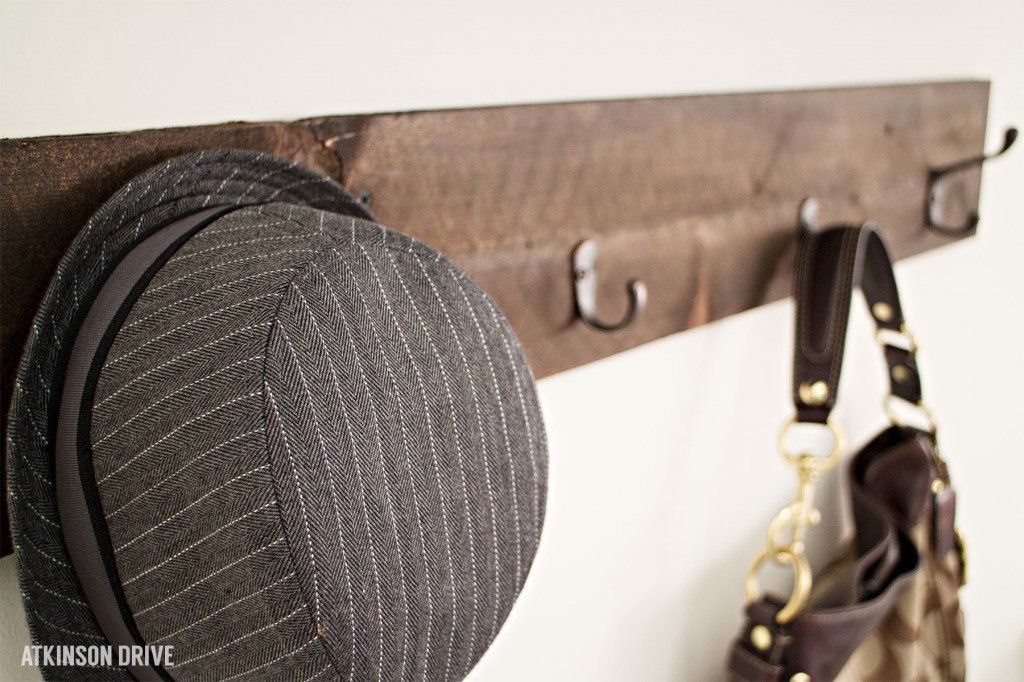 Organize your entry way this Winter with an easy DIY option for organizing coats, hats, purses, and more! This project is beautiful and functional! /// by Atkinson Drive