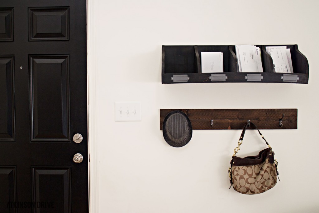 Organize your entry way this Winter with an easy DIY option for organizing coats, hats, purses, and more! This project is beautiful and functional! /// by Atkinson Drive