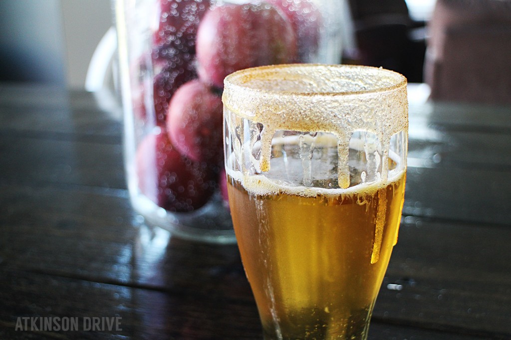 Looking for a Fall treat to beat the heat? This chilled caramel apple cider (just for grown-ups) is the perfect early Fall cocktail!
