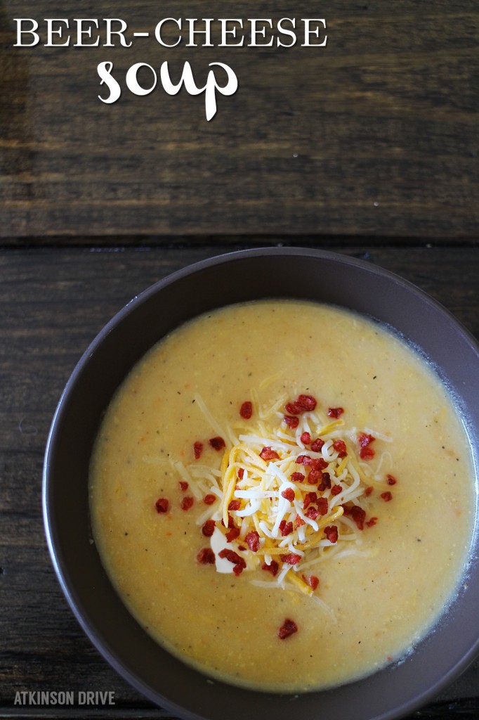 This deliciously comforting soup is filled to the brim with beer, bacon, and cheddar cheese ... and it's great for families (with a few hidden vegetables)! /// by Atkinson Drive