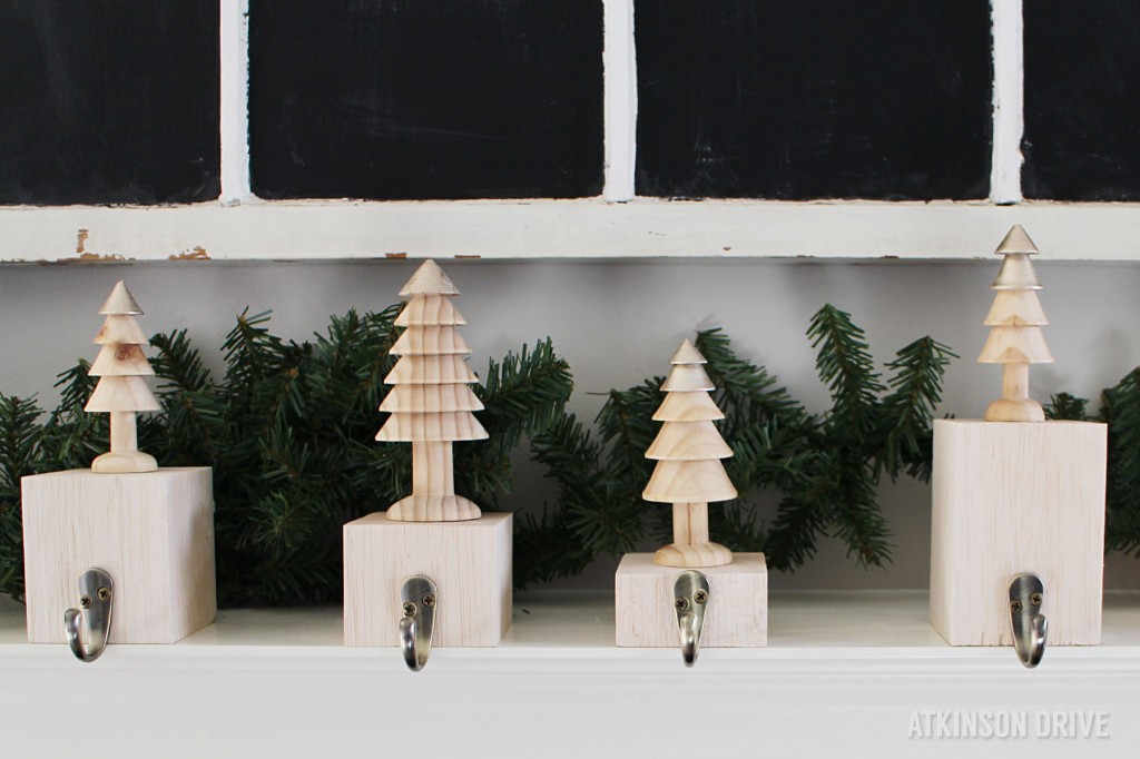 Make your own metallic wood stocking hangers - on a budget - with this simple tutorial by Atkinson Drive!